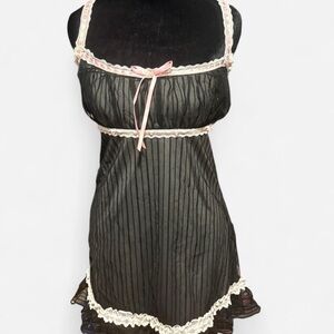 Black and pink lace trimmed babydoll dress
New with tags